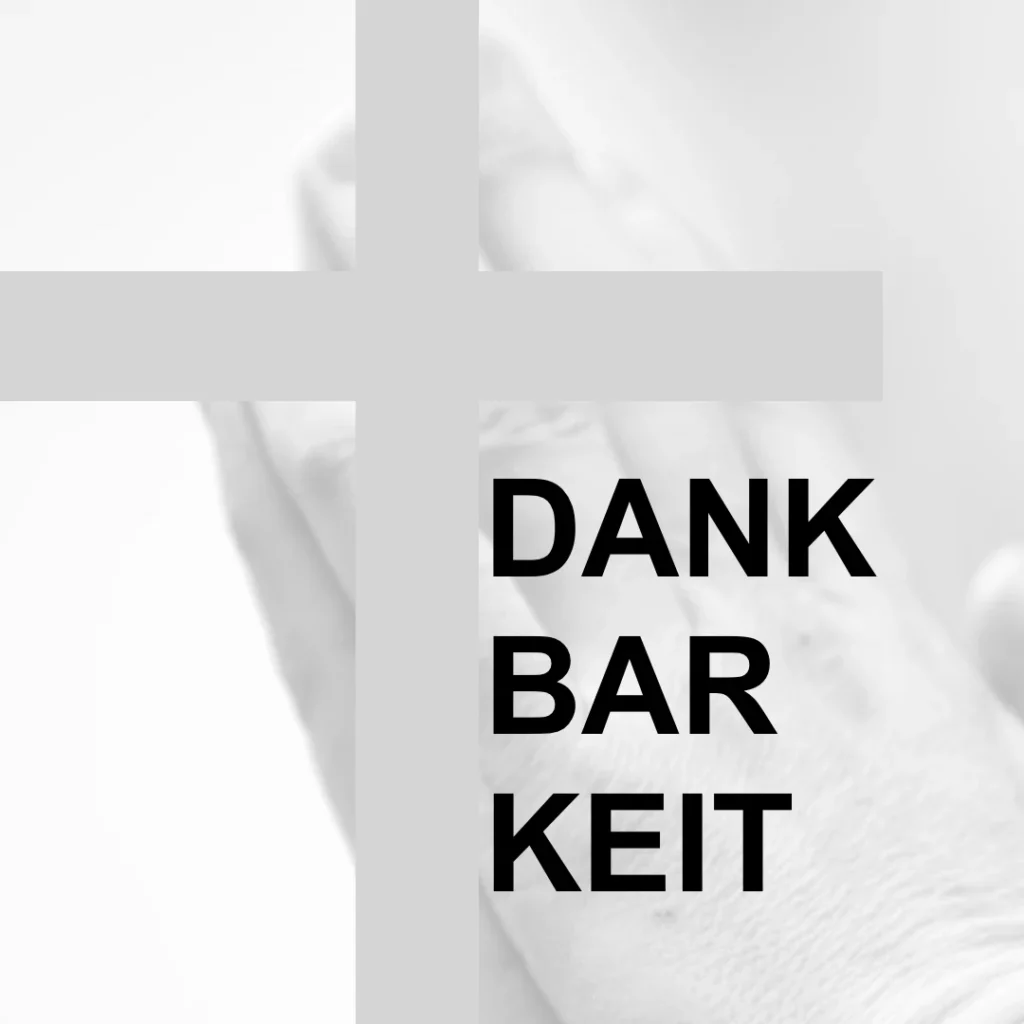 Das Bild zeigt im Hintergrund betende Hände, ein Kreuz und den Text: Dankbarkeit.