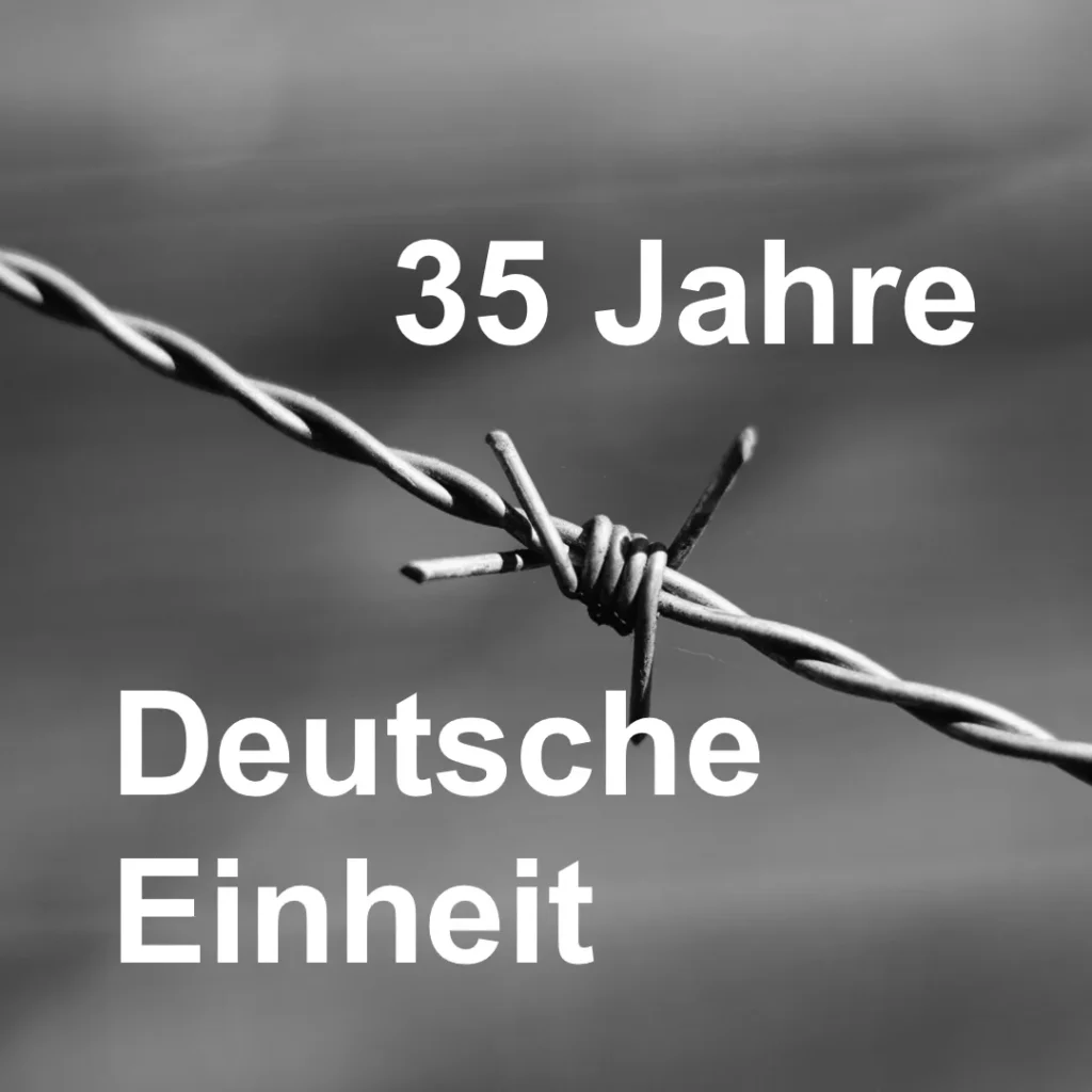 Das Bild zeigt in der Mitte einen Strang Stacheldrahtzaun. Text: 35 Jahre Deutsche Einheit"